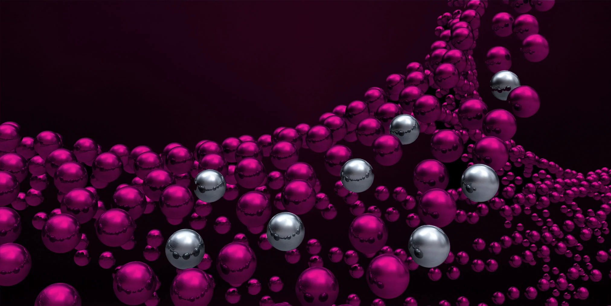 PVD Metallizing hero image, a mix of purple and silver shiny balls on a black background
